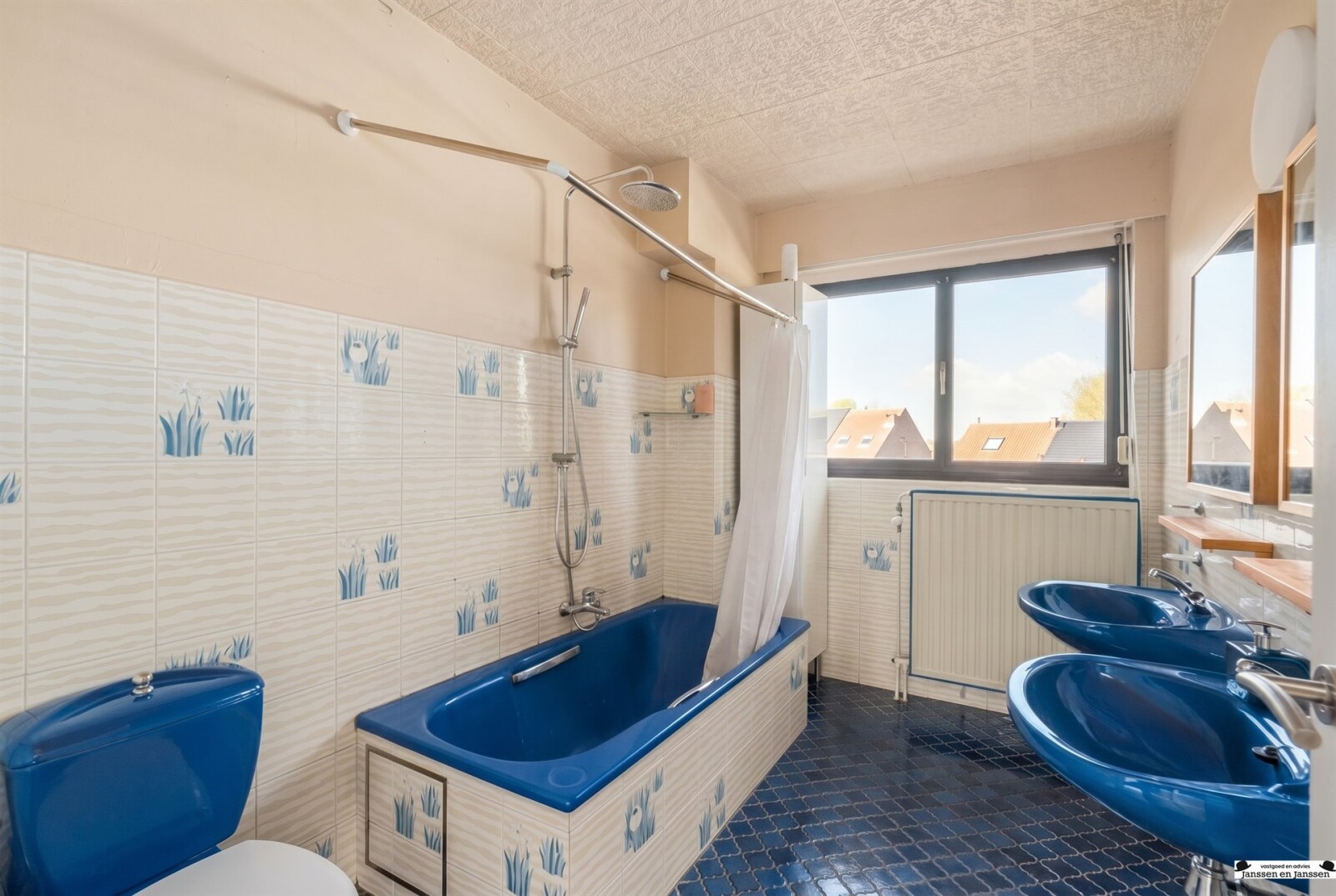 blue-tiled-bathroom-interior