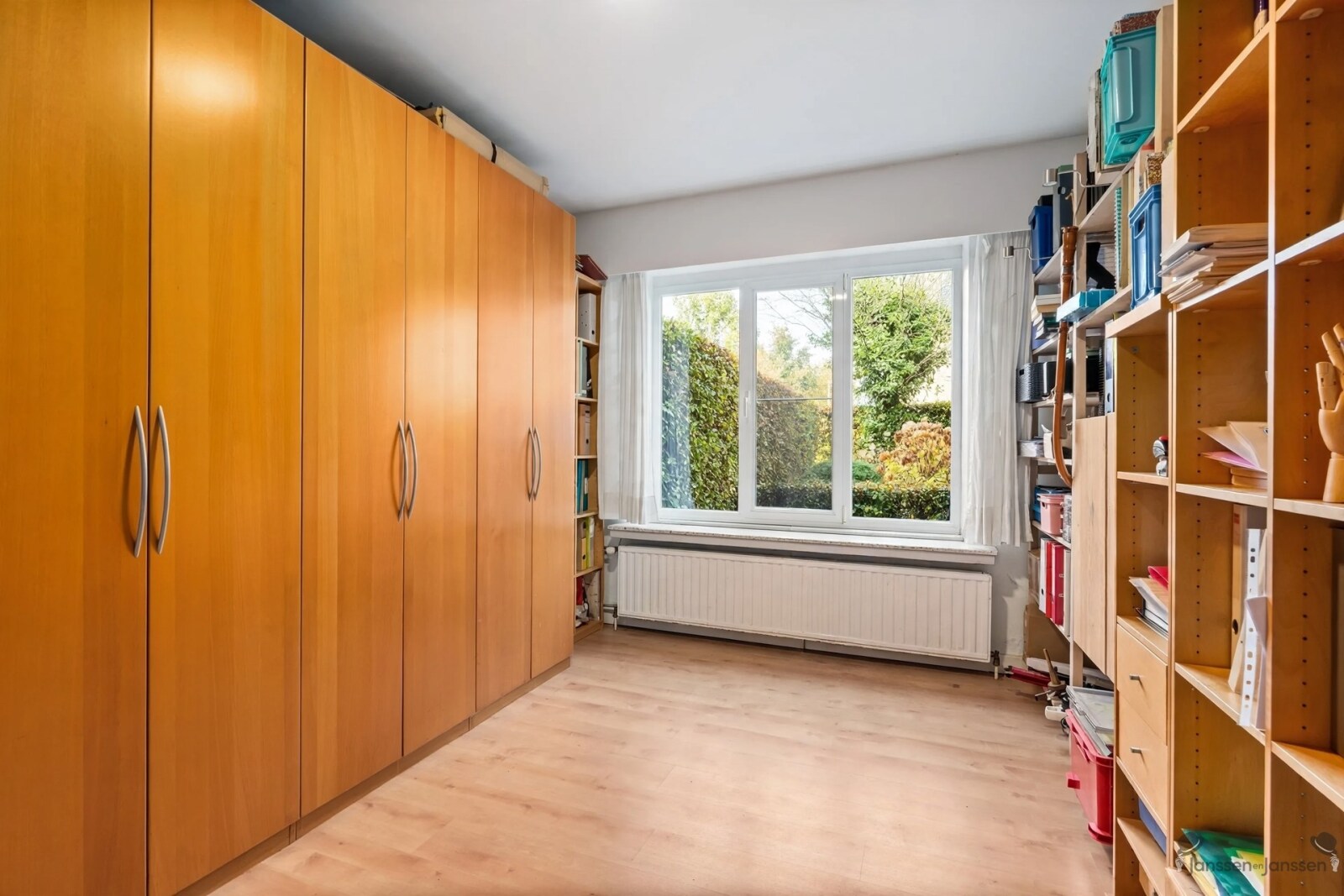 room-with-wooden-wardrobe-and-shelving