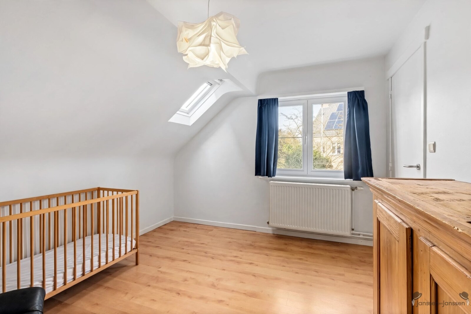 attic-room-with-crib-and-crosstrainer