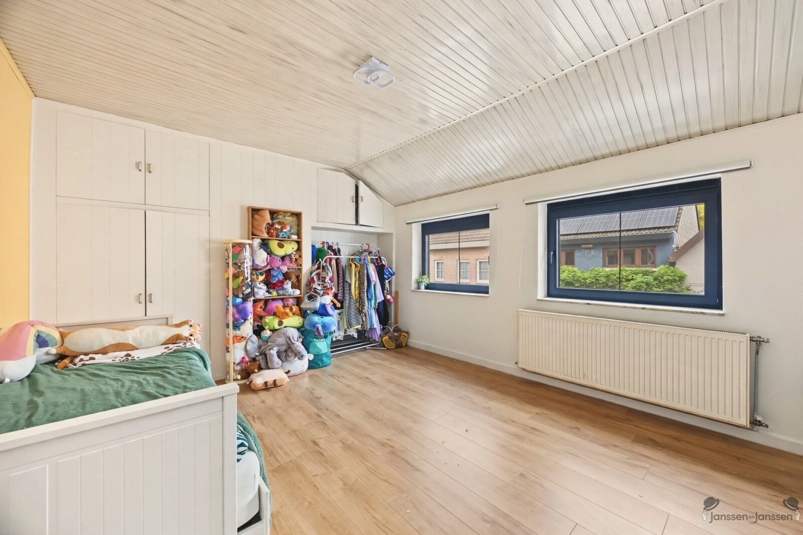 bright-childrens-bedroom-with-sloped-ceiling
