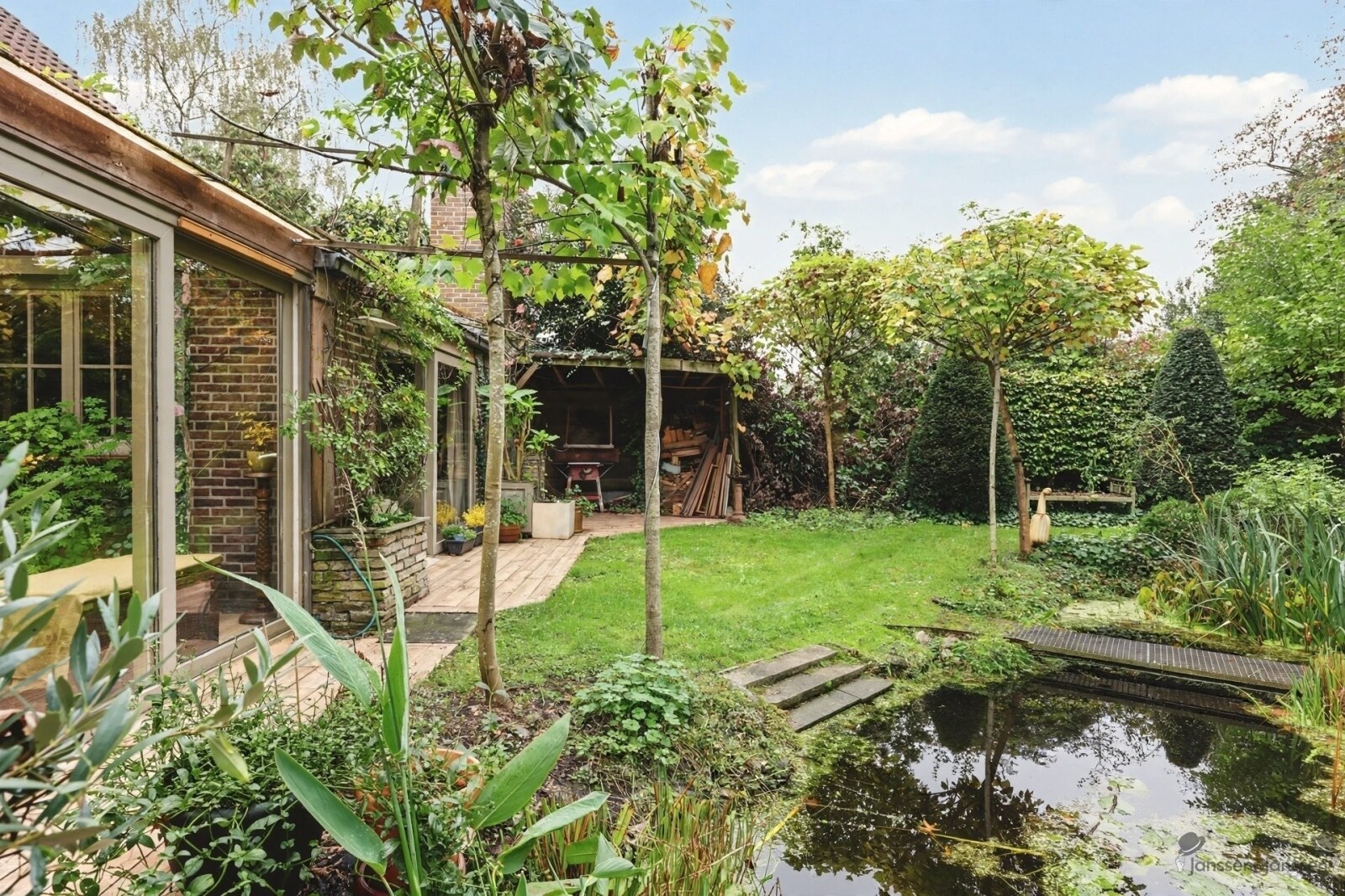 lush-backyard-garden-with-pond