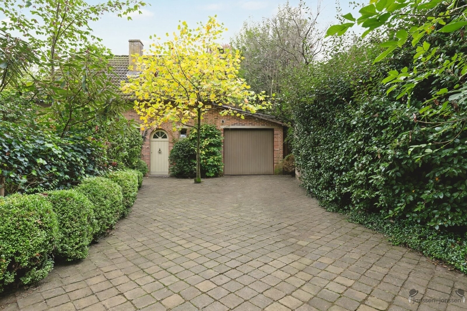 1green-driveway-leading-to-garage