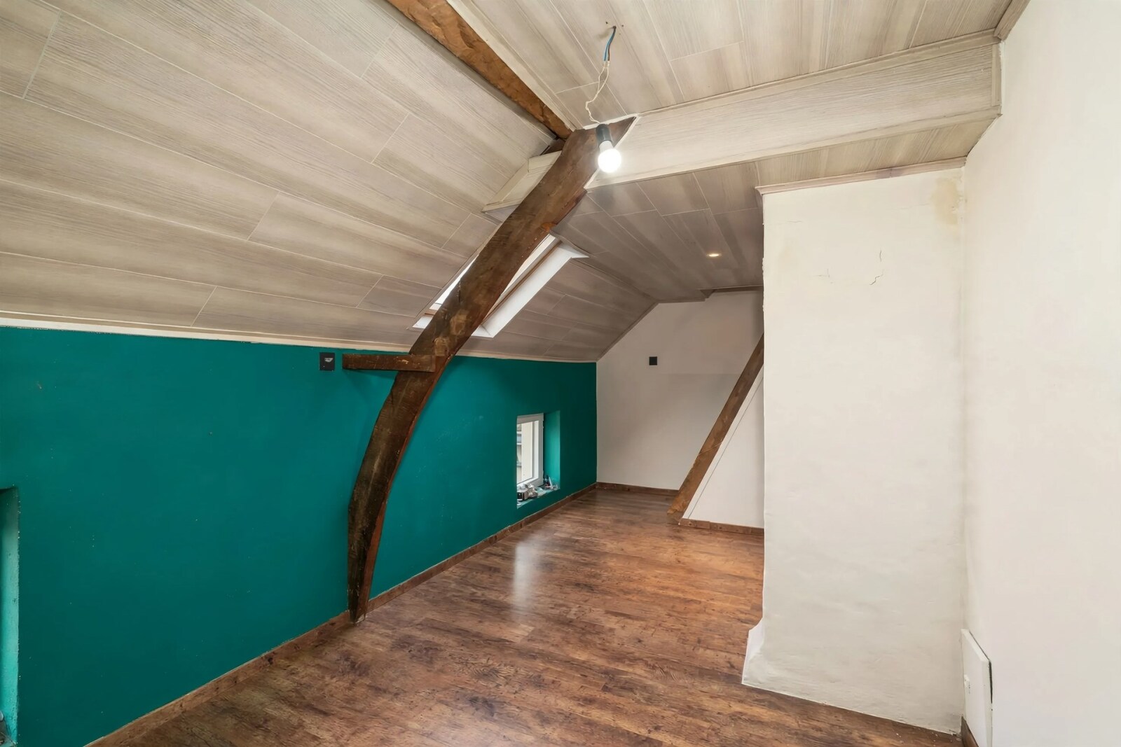 empty-attic-room-with-beams