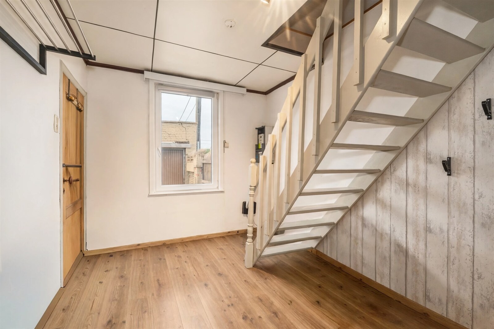 hallway-interior-with-wooden-stairs