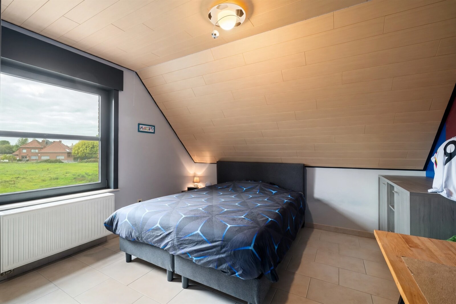 attic-bedroom-with-sloped-ceiling